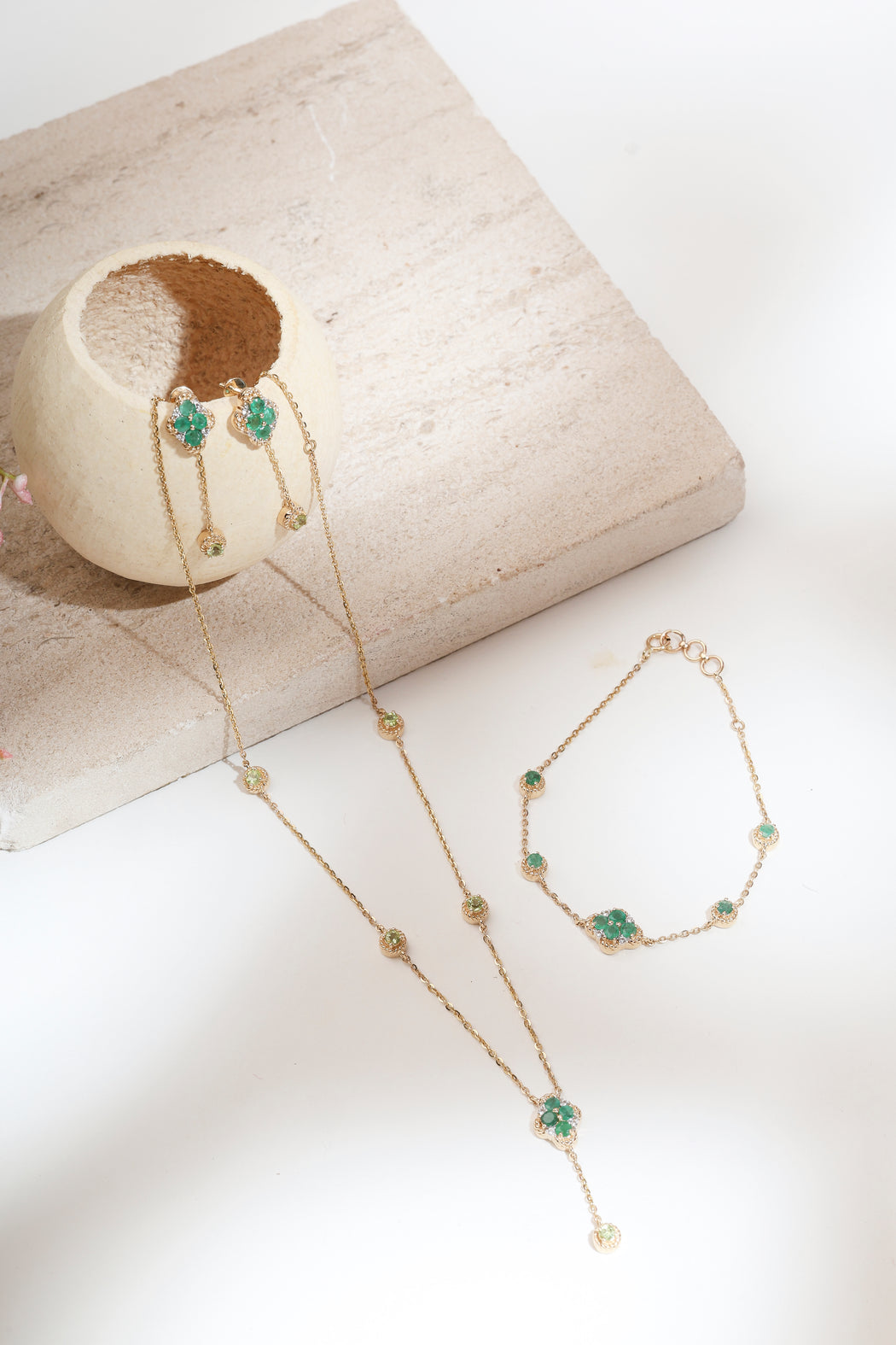 Emerald and peridot set with white sapphire in 14k gold