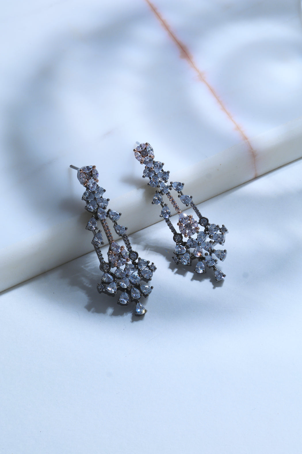 Fancy cut diamonds in black rhodium earrings